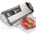 Machine de mise sous vide associant un eclairage de la zone de travail au coloris gris